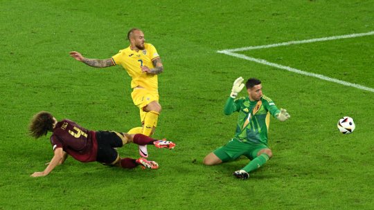 Fotbalistul român care i-a atras atenția unui fotograf de la Getty! Cadrele suprinse chiar pe gazon, imediat după Belgia - România 2-0