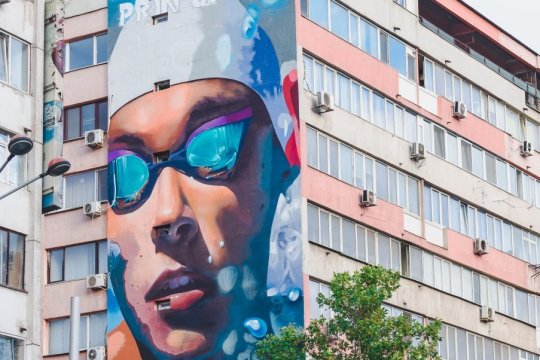FOTO | David Popovici, sărbătorit prin artă stradală. Imagine impresionantă pe un bulevard din București