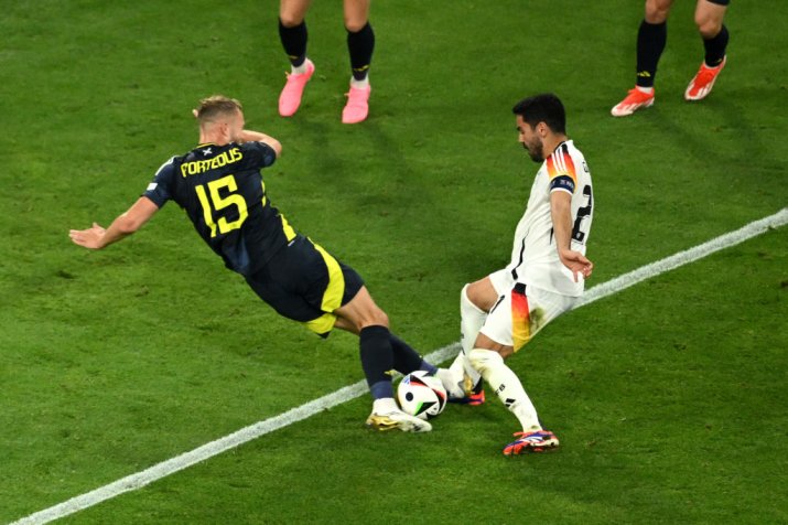 Duel tare la Germania - Scoția, între Gundogan și Porteous, soldat cu penalty pentru nemți