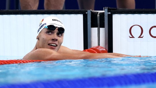 Cursa lui David Popovici, difuzată pe Ilie Oană! Cum au reacționat fanii Rapidului și Petrolului când românul a cucerit aurul olimpic + Mesajul senzațional al prahovenilor pentru înotător