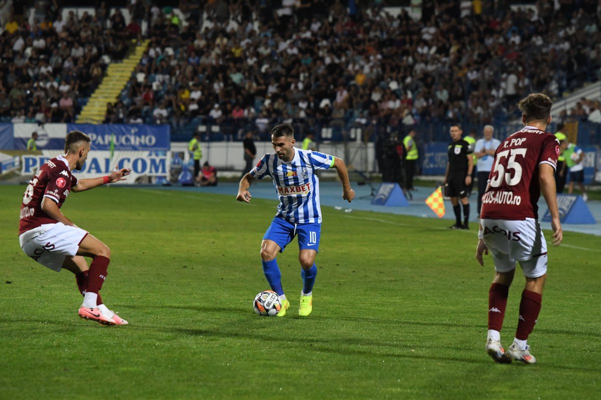 Alin Roman, Răzvan Oaidă și Rareș Pop, în meciul dintre Poli Iași si Rapid, contând pentru SuperLiga, desfășurat pe Stadionul Emil Alexandrescu din Iași, vineri 23 august 2024