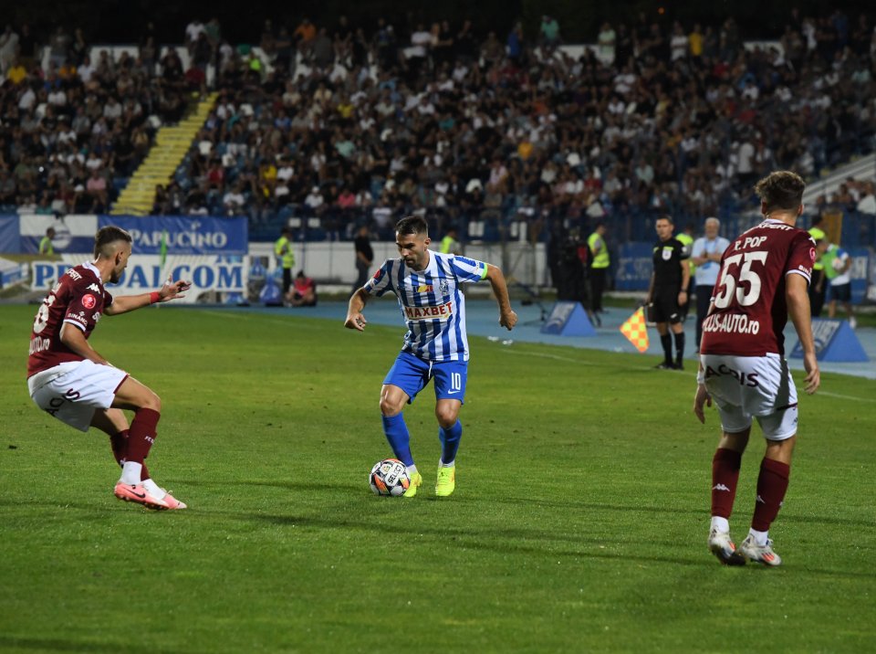 Alin Roman, Răzvan Oaidă și Rareș Pop, în meciul dintre Poli Iași si Rapid, contând pentru SuperLiga, desfășurat pe Stadionul Emil Alexandrescu din Iași, vineri 23 august 2024