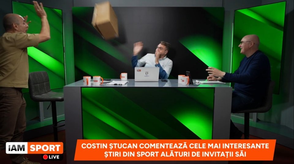 Momentul în care Alexandru David aruncă cu o cutie de carton spre Costin Ștucan