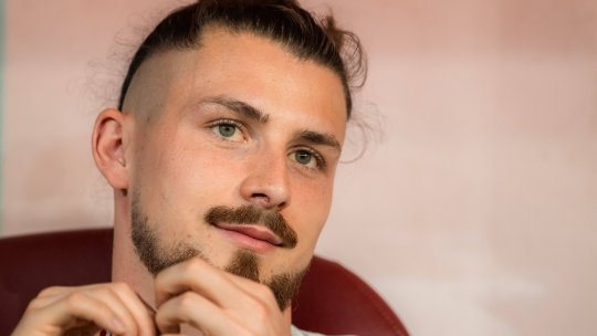 Tottenham nu l-a inclus pe Radu Drăgușin pe lista pentru Champions League