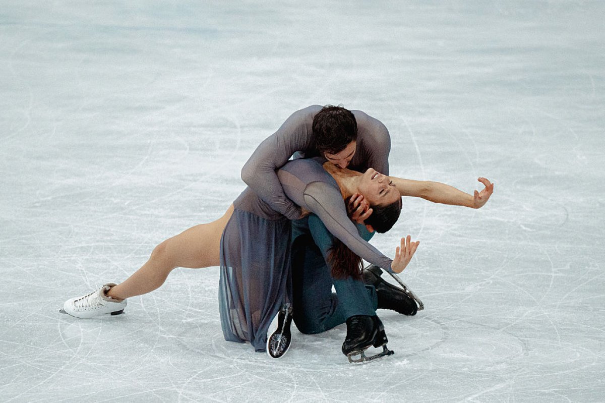 Laurence Fournier Beaudry și Guillaume Cizeron, în timpul performanței de la JO 2026